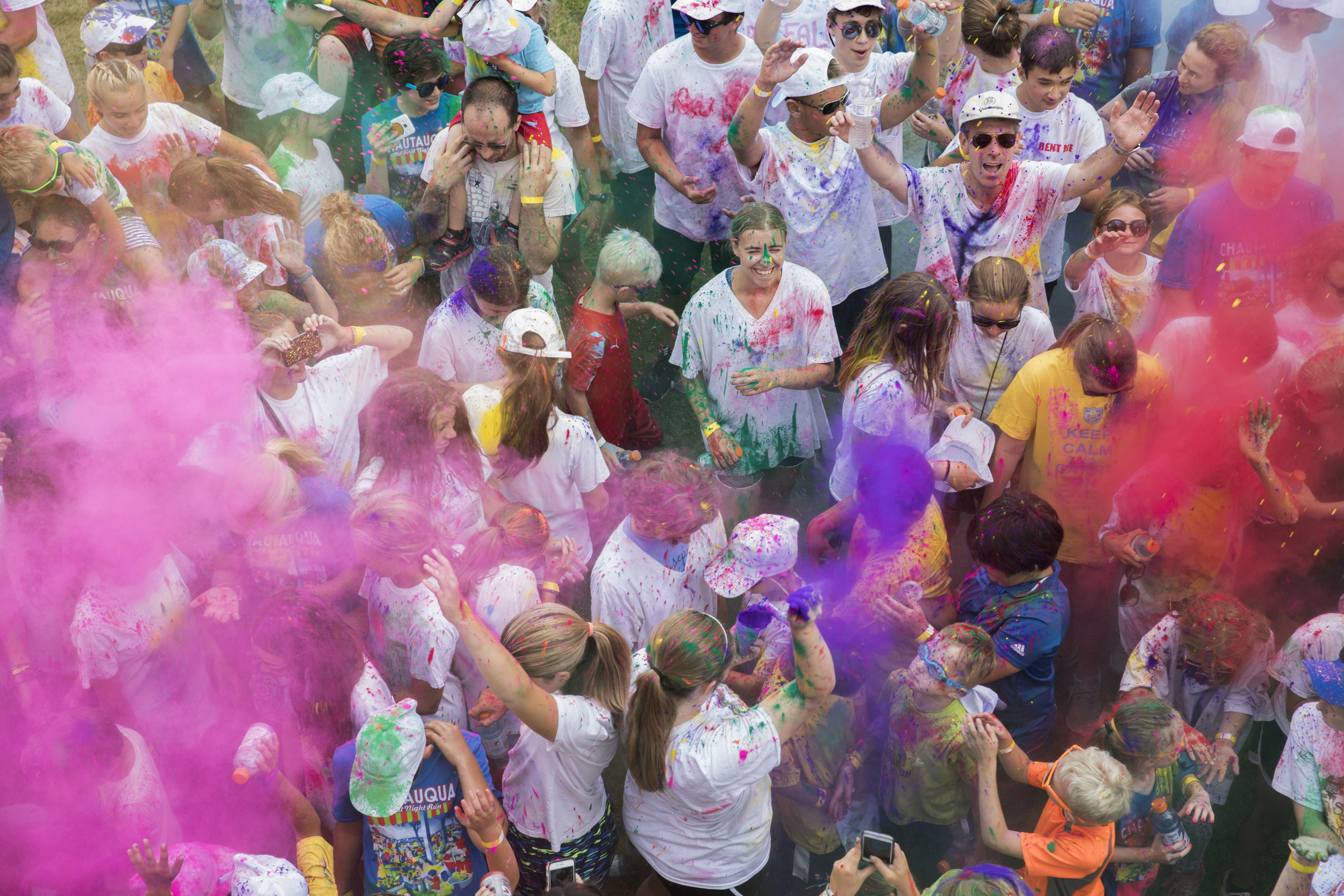  Chautauquans celebrate at the end of the first-ever Color Run on Thursday, Aug.&nbsp;10, 2017 in Heinz Beach. 