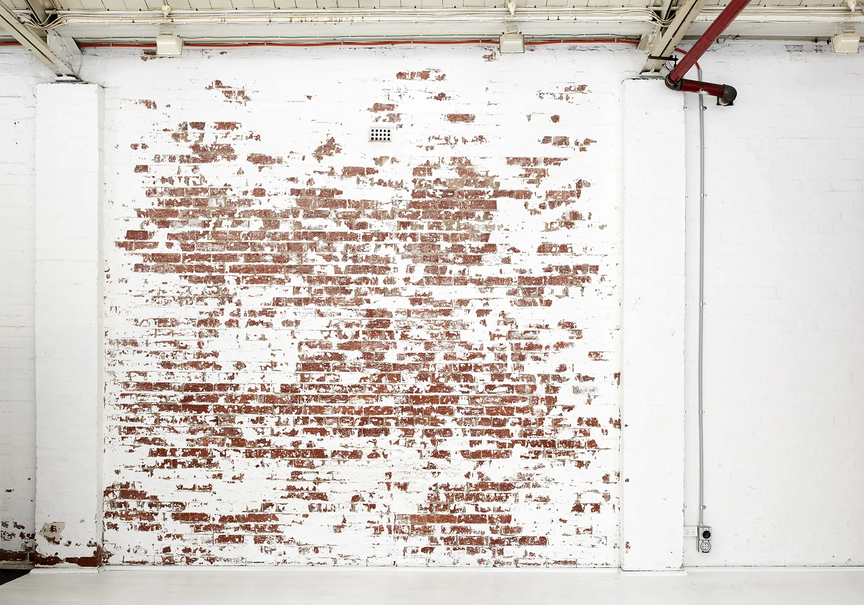 EXPOSED BRICK WALL
