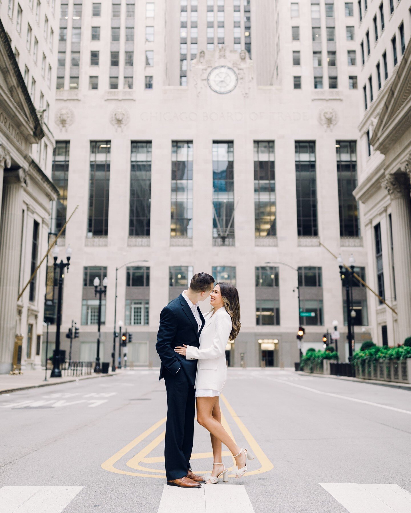 We are in love with these downtown Chicago Engagement pictures. Such romantic and chic vibes that provided the perfect atmosphere for John &amp; Dani's session.