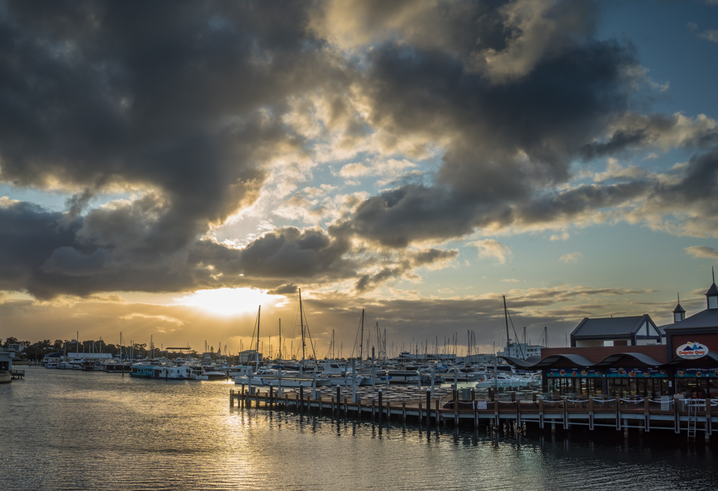 Sunset over the marina at Dolphin Quay