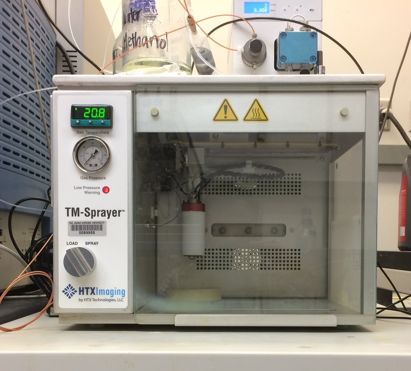 Figure 1. HTX TM-Sprayer in the lab of Dr. Namandje N. Bumpus at Johns Hopkins University School of Medicine.