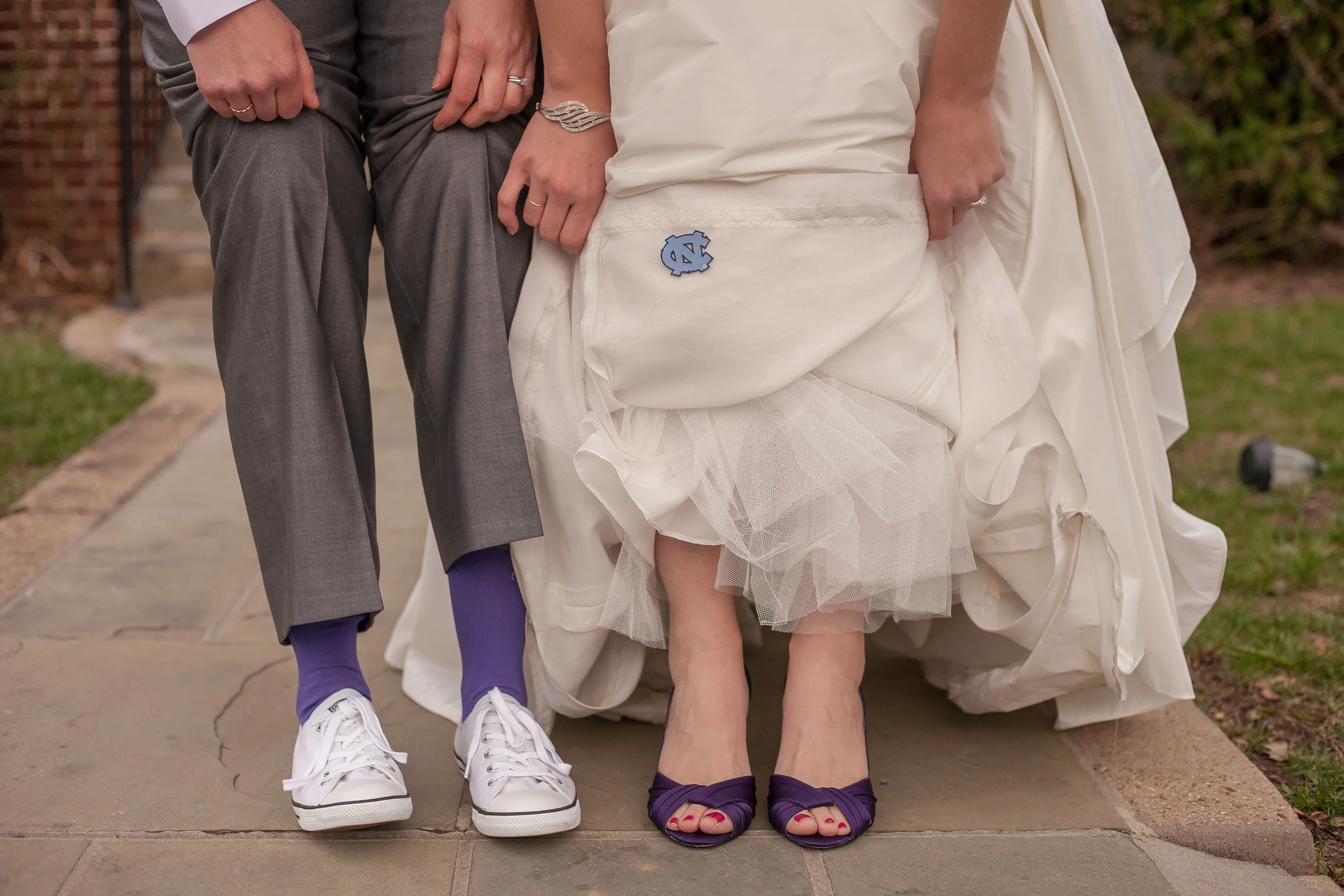 Megan is a Duke fan, but she put a UNC logo inside her dress because Alison loves the Tar Heels!
