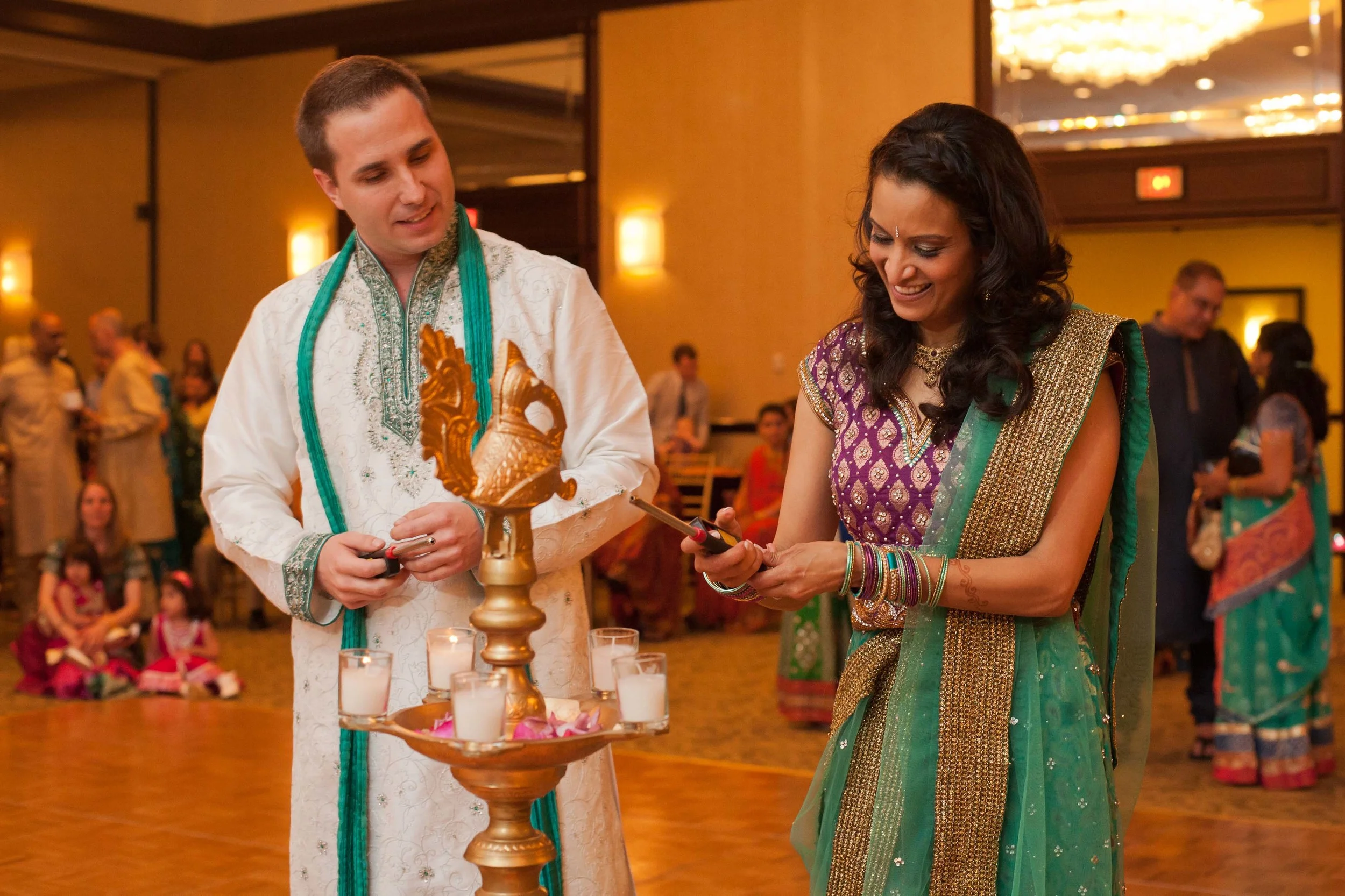 Matt and Aditi light the candles at the center of the dancefloor for the Garba portion of the night.