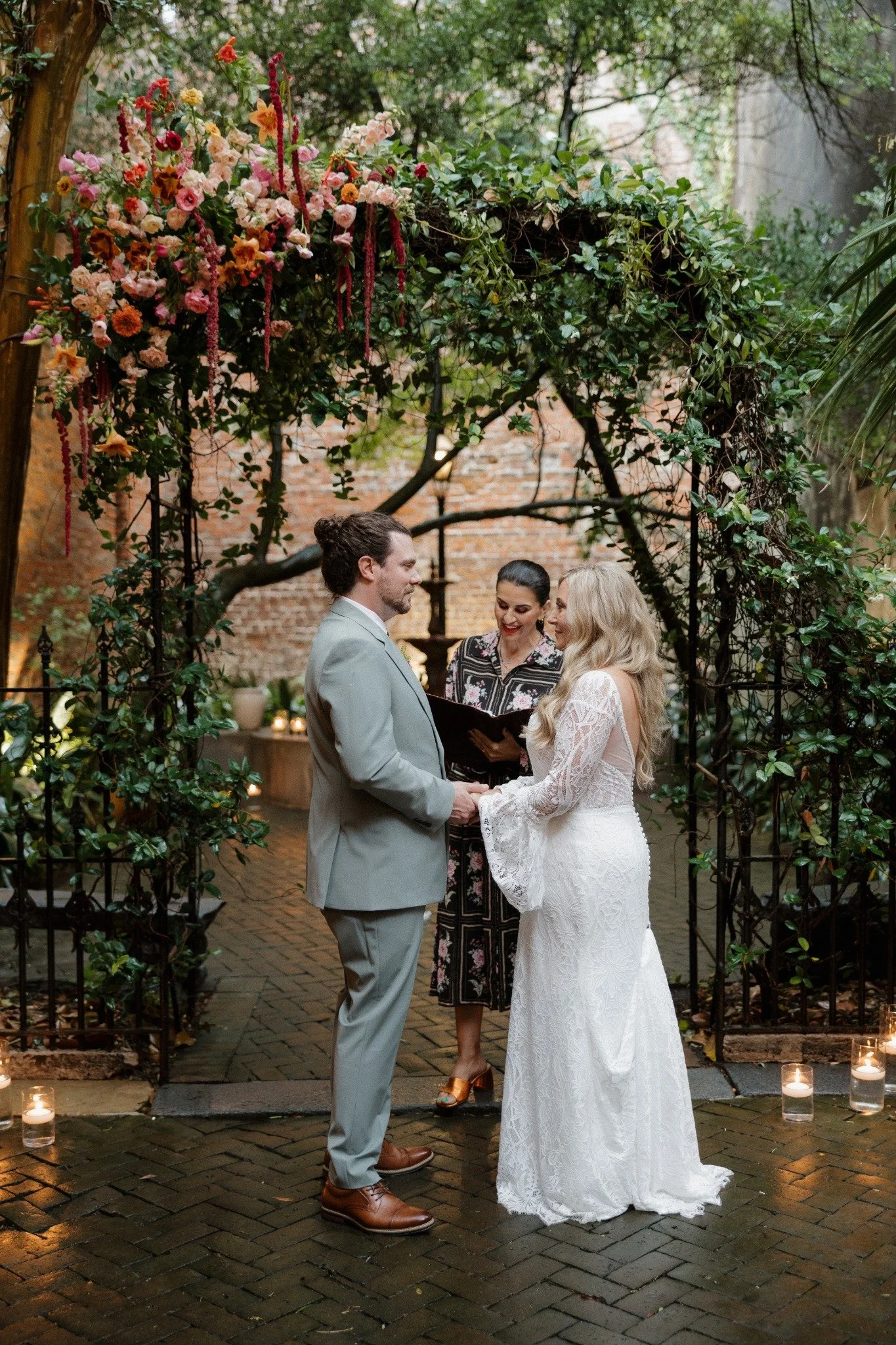 Austin and Haley exchanging vows at the New Orleans Pharmacy Museum