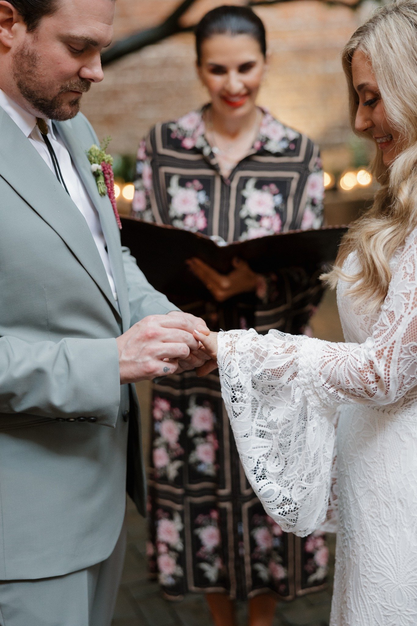 Austin and Haley exchanging rings with Ranna Zahra officiating