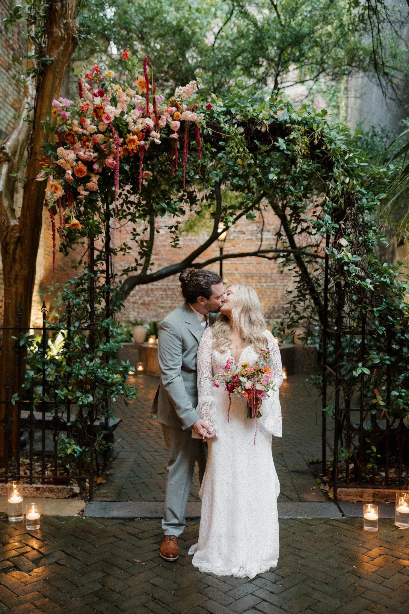 Austin and Haley wedding portrait in the New Orleans Pharmacy Museum courtyard
