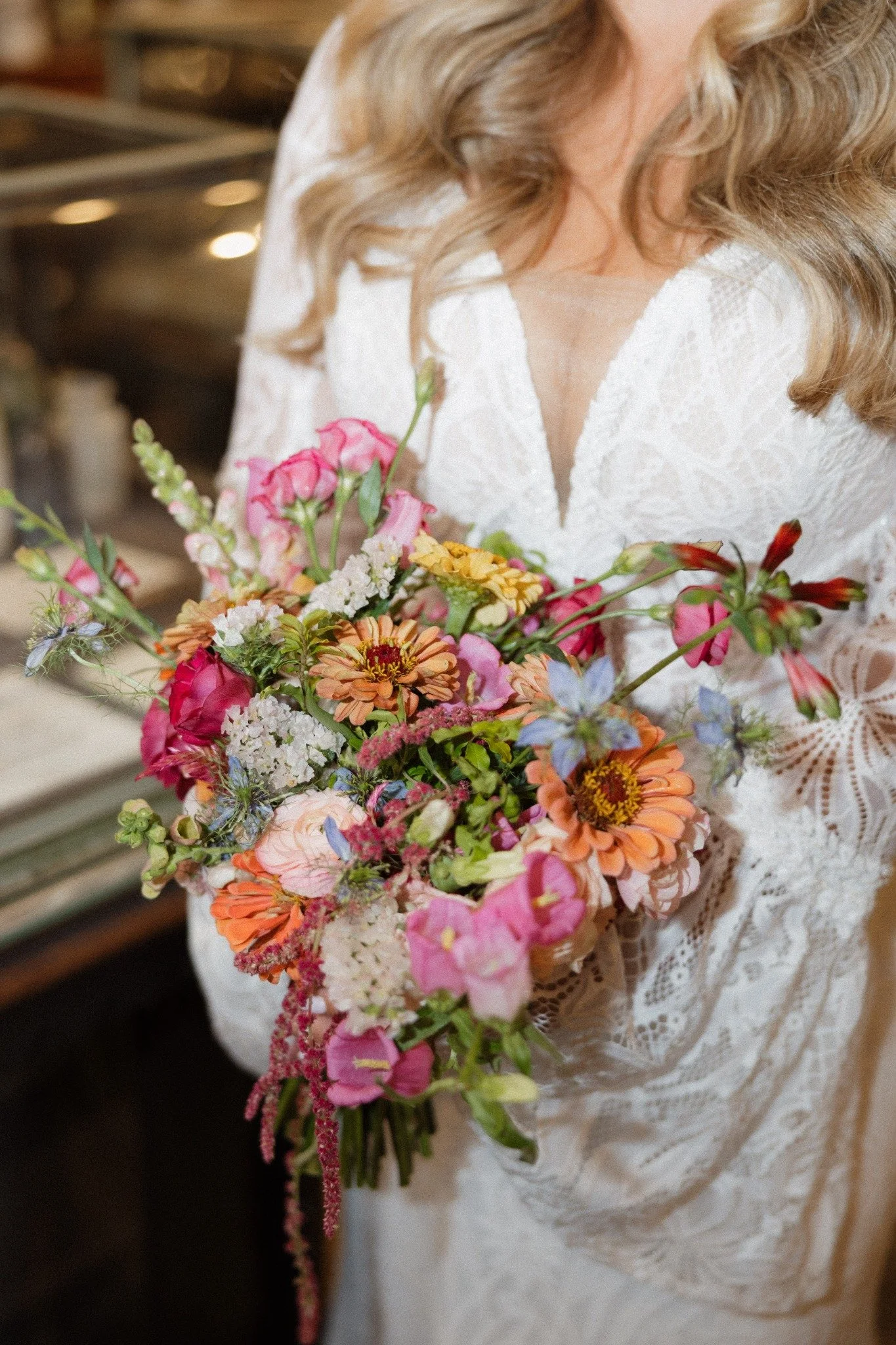 Bride holding a colorful New Orleans wedding bouquet