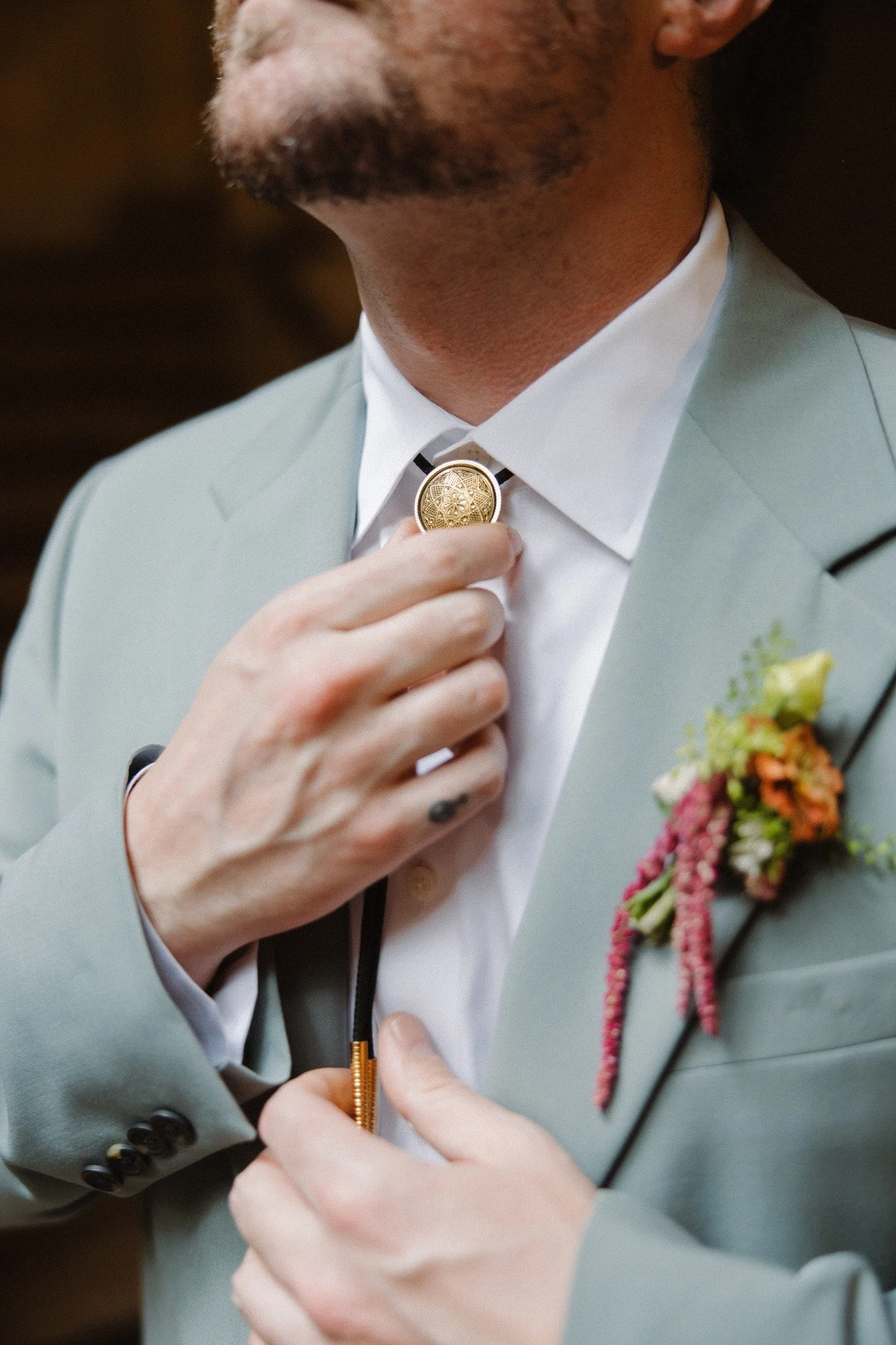 Groom portrait with floral boutonniere at the Pharmacy Museum