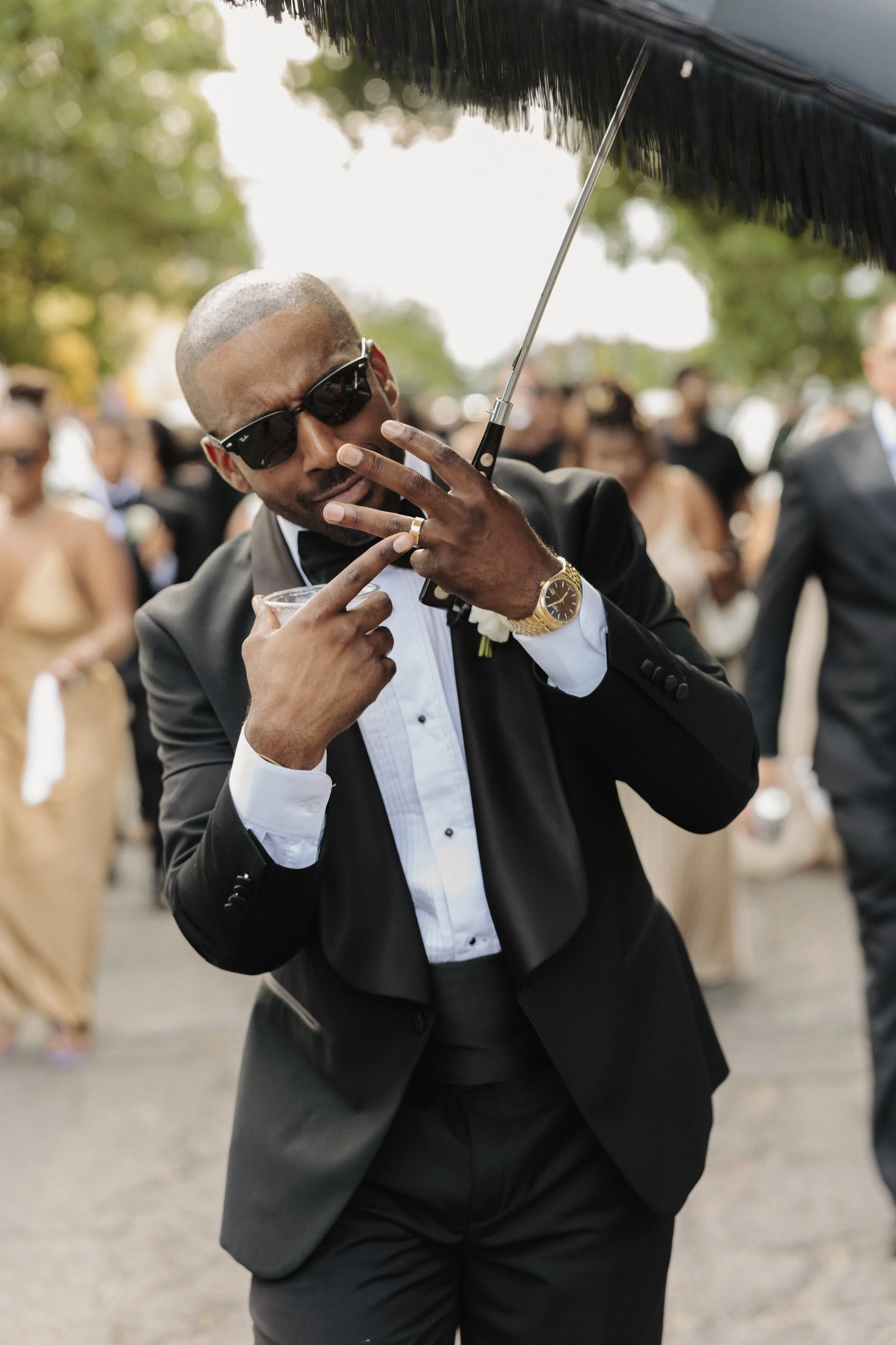 marquez fotos groom during a second line in marigny new orleans 