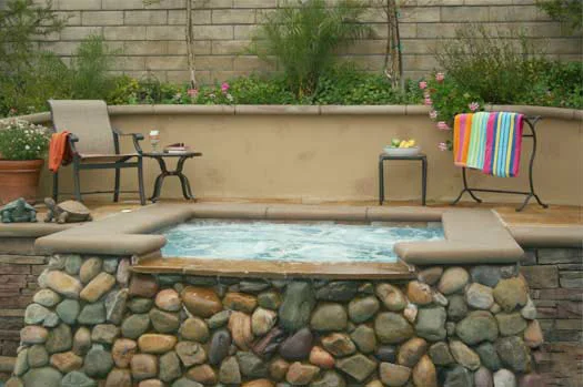 Custom-River-Rock-Spa-Enclosure.jpg