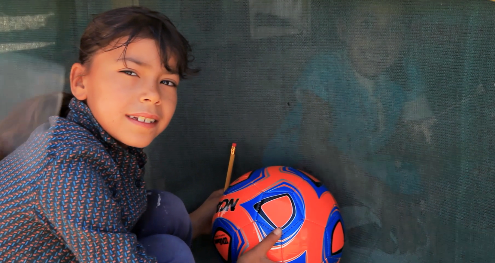 Blue orange soccer ball CU.png