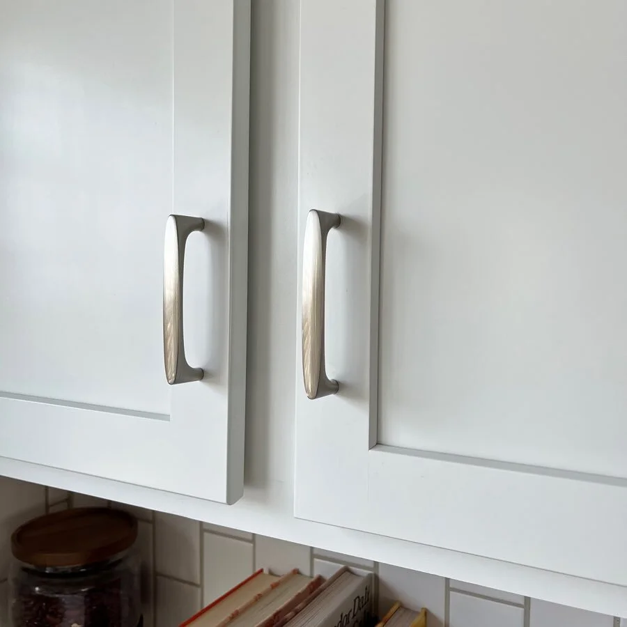 Why does changing out your cabinet hardware make everything better? We had the popular builder grade pulls, and they were annoying to look at. I like these better.