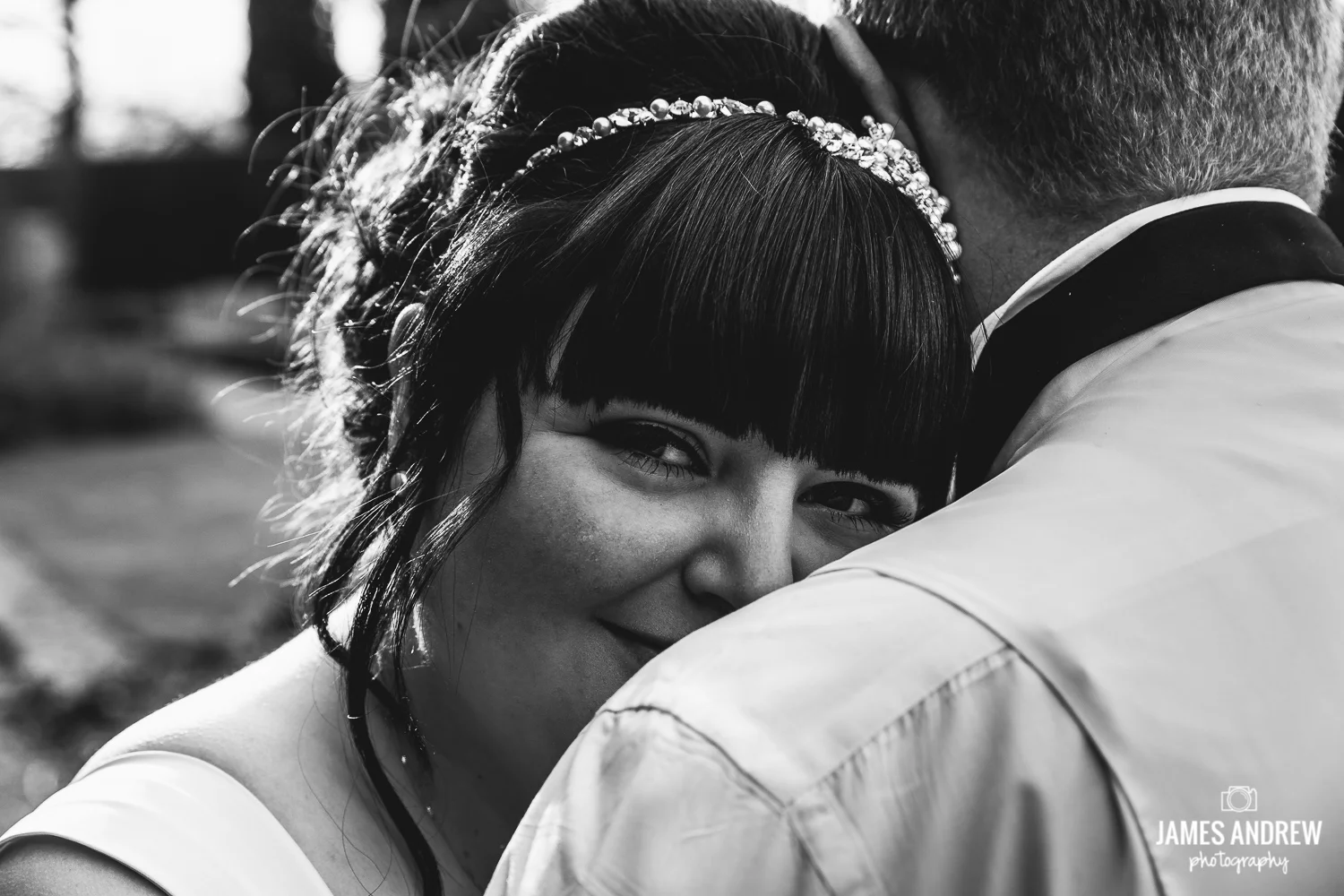 couple portrait bride looking at camera
