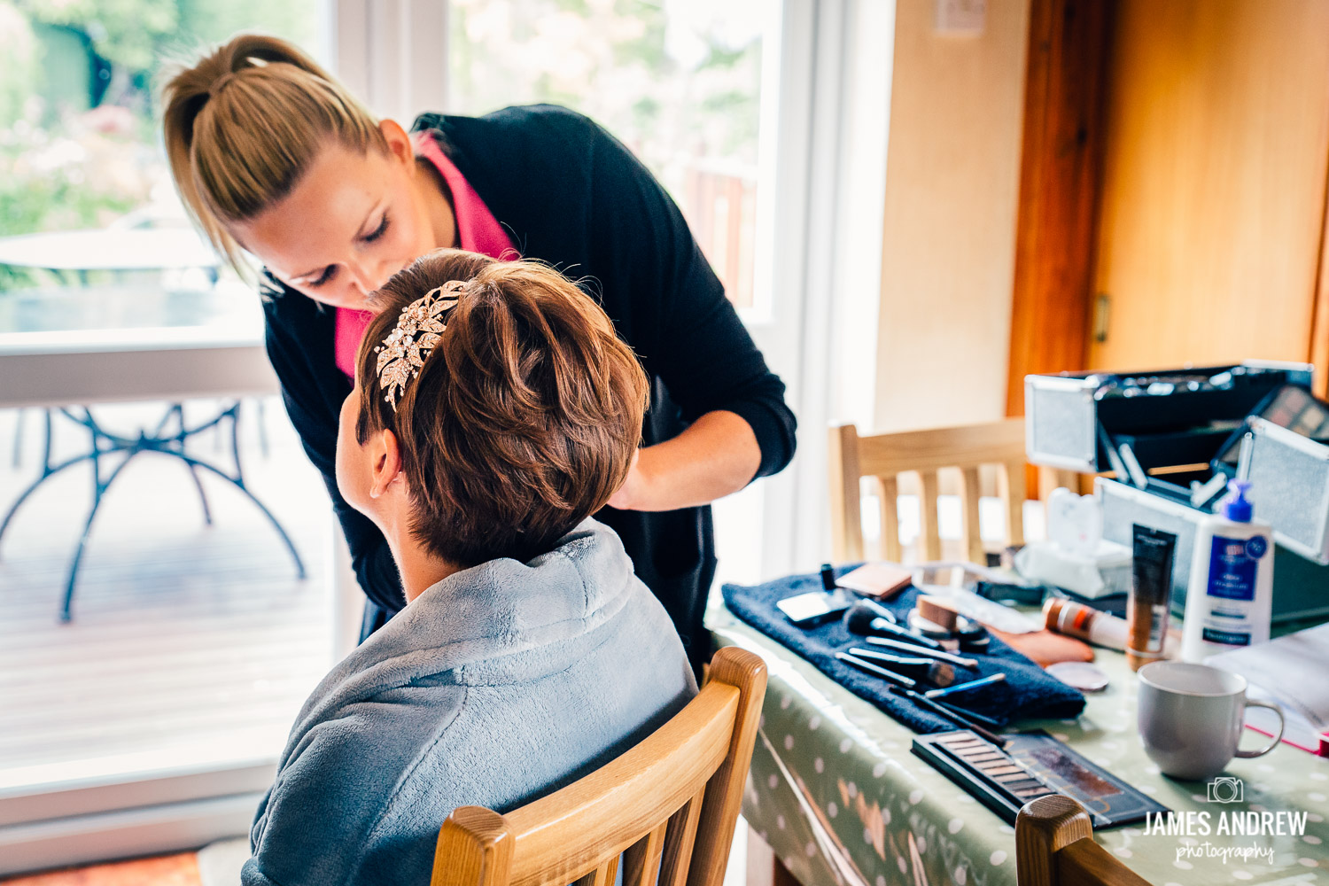 bride wedding make up artist window light