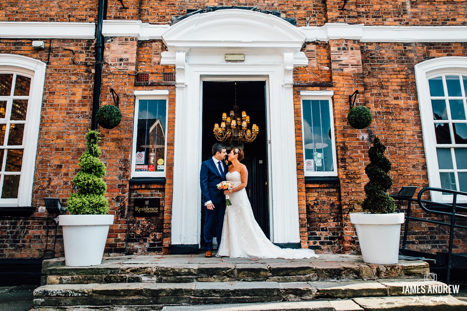 bride and groom in front of wedding venue nantwich cheshire northwest