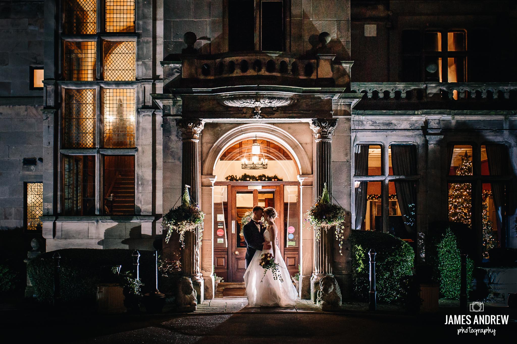 Bride And Groom Rookery Hall Doorway At Night creative portrait