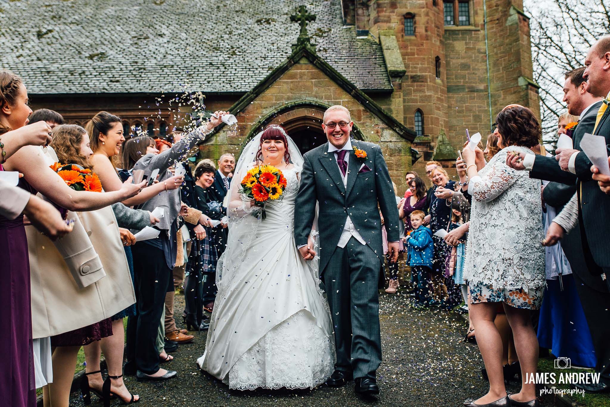 bride and groom leaving church confetti shot cheshire