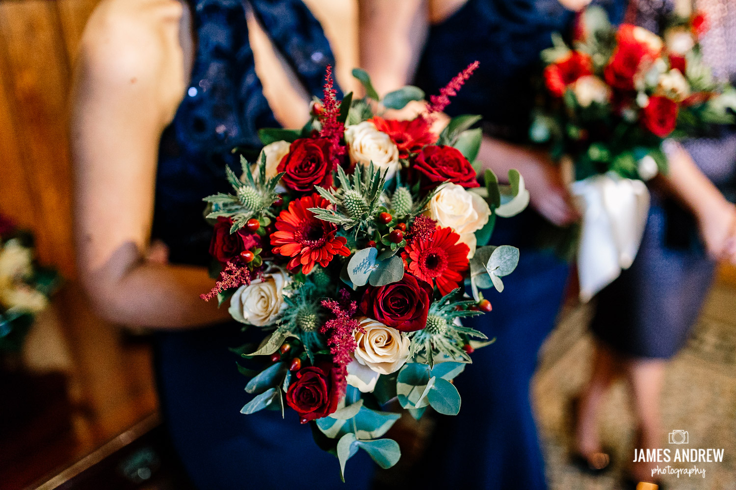 Bridesmaid with winter wedding flowers