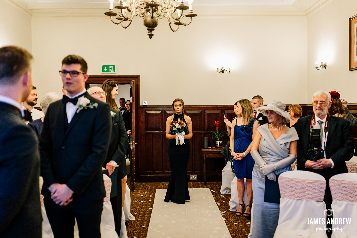 Bridesmaid walking down the isle