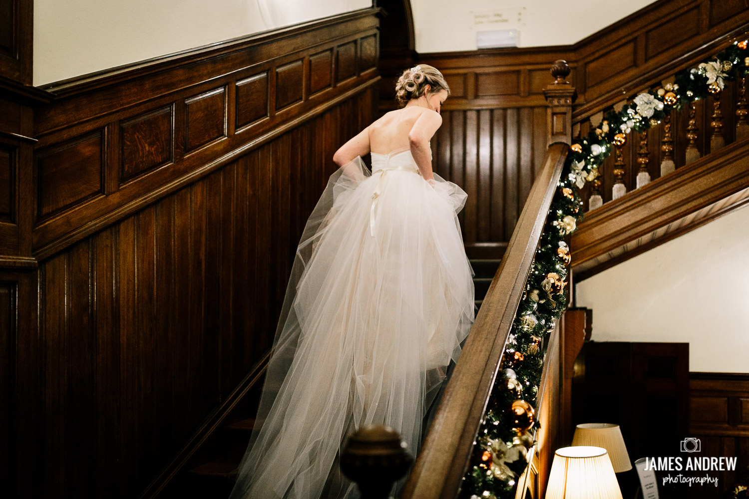Bride running upstairs