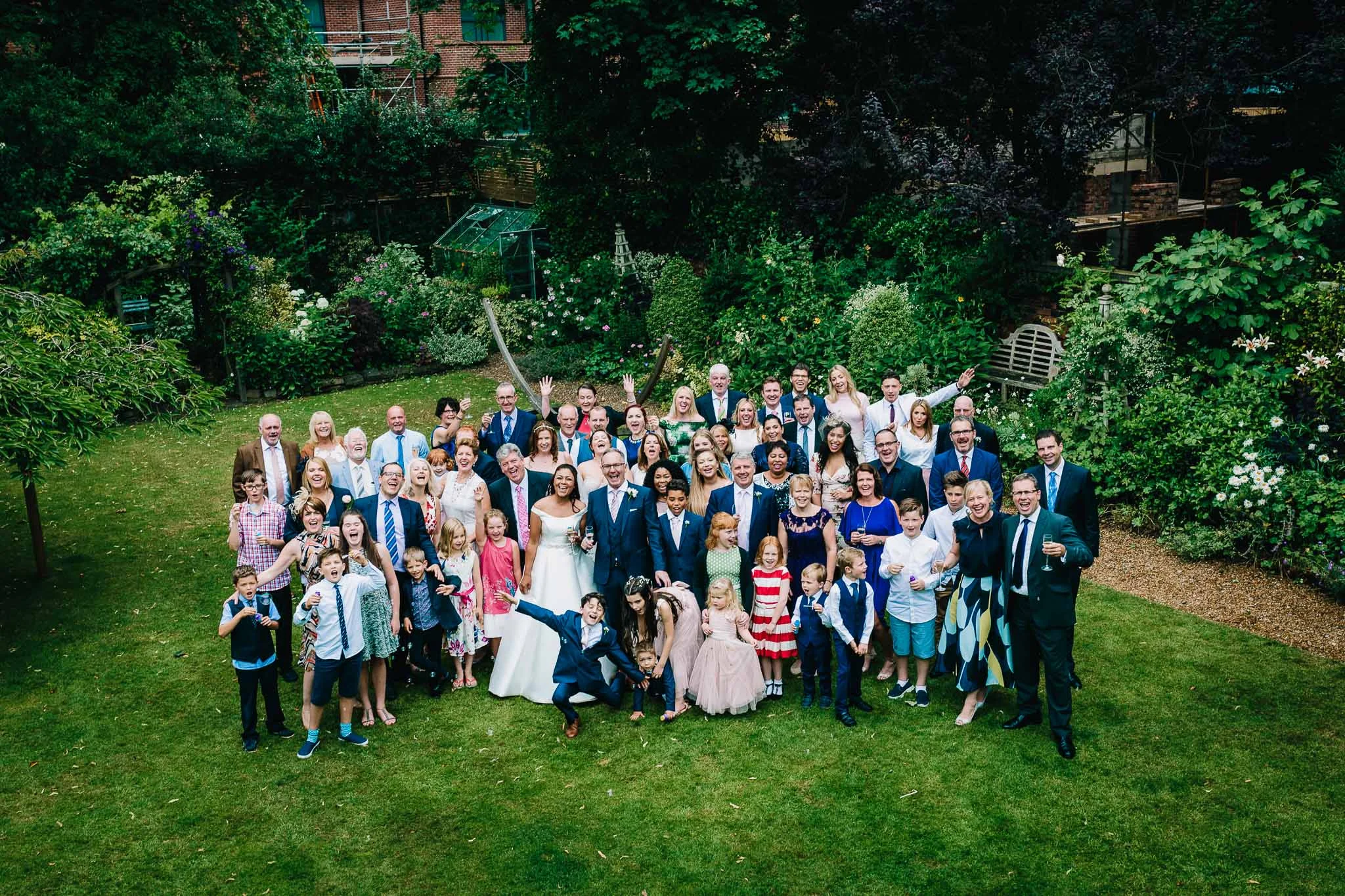 WEDDINGS GROUP PICTURE GARDEN CHESHIRE