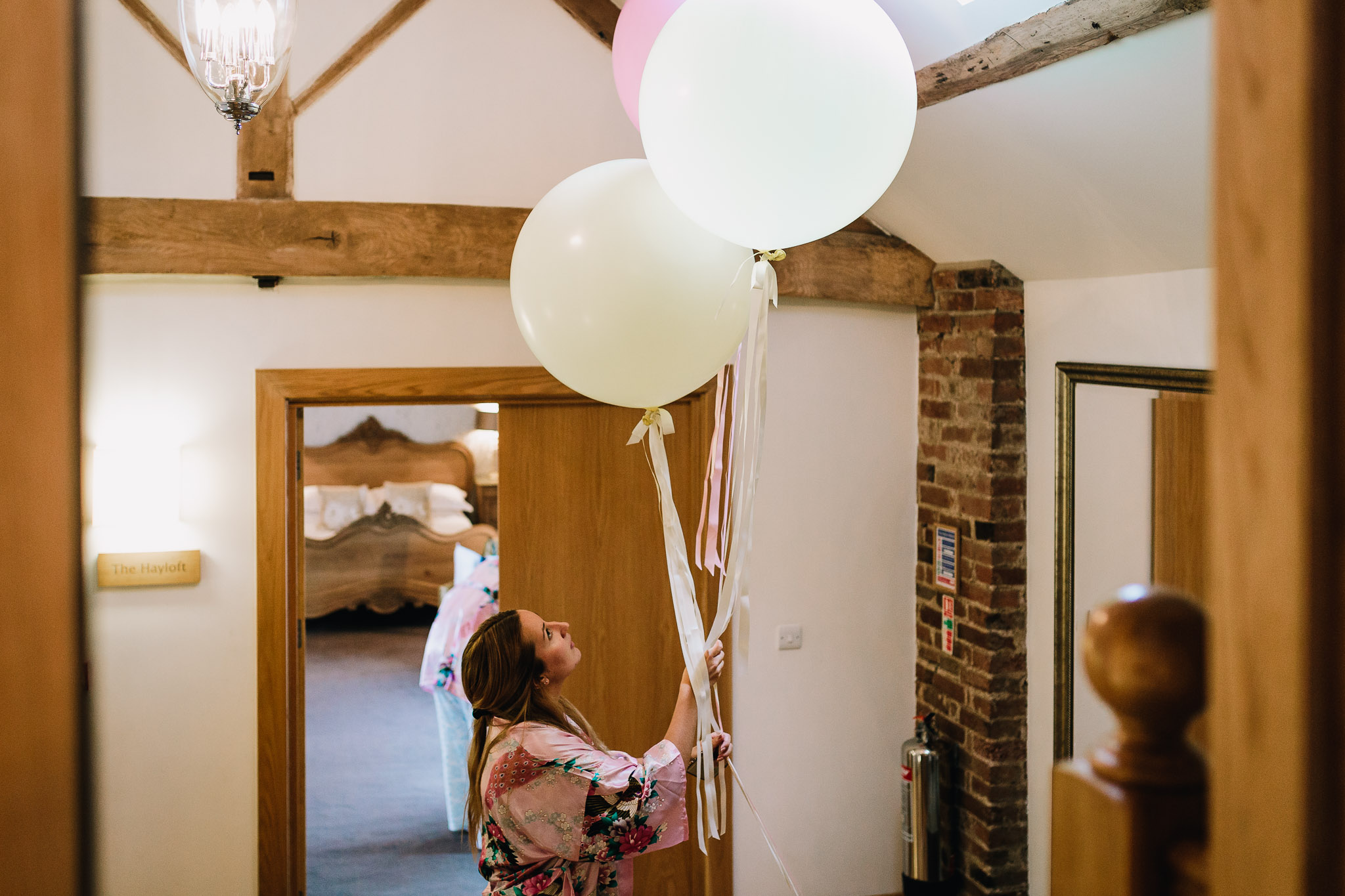 BRIDESMAID HOLDING WEDDING PRETTY BALLOONS