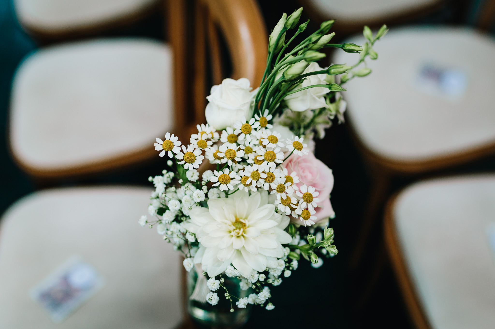 THE GARDEN ROSE FLOWERS ON WEDDING CEREMONY CHAIRS