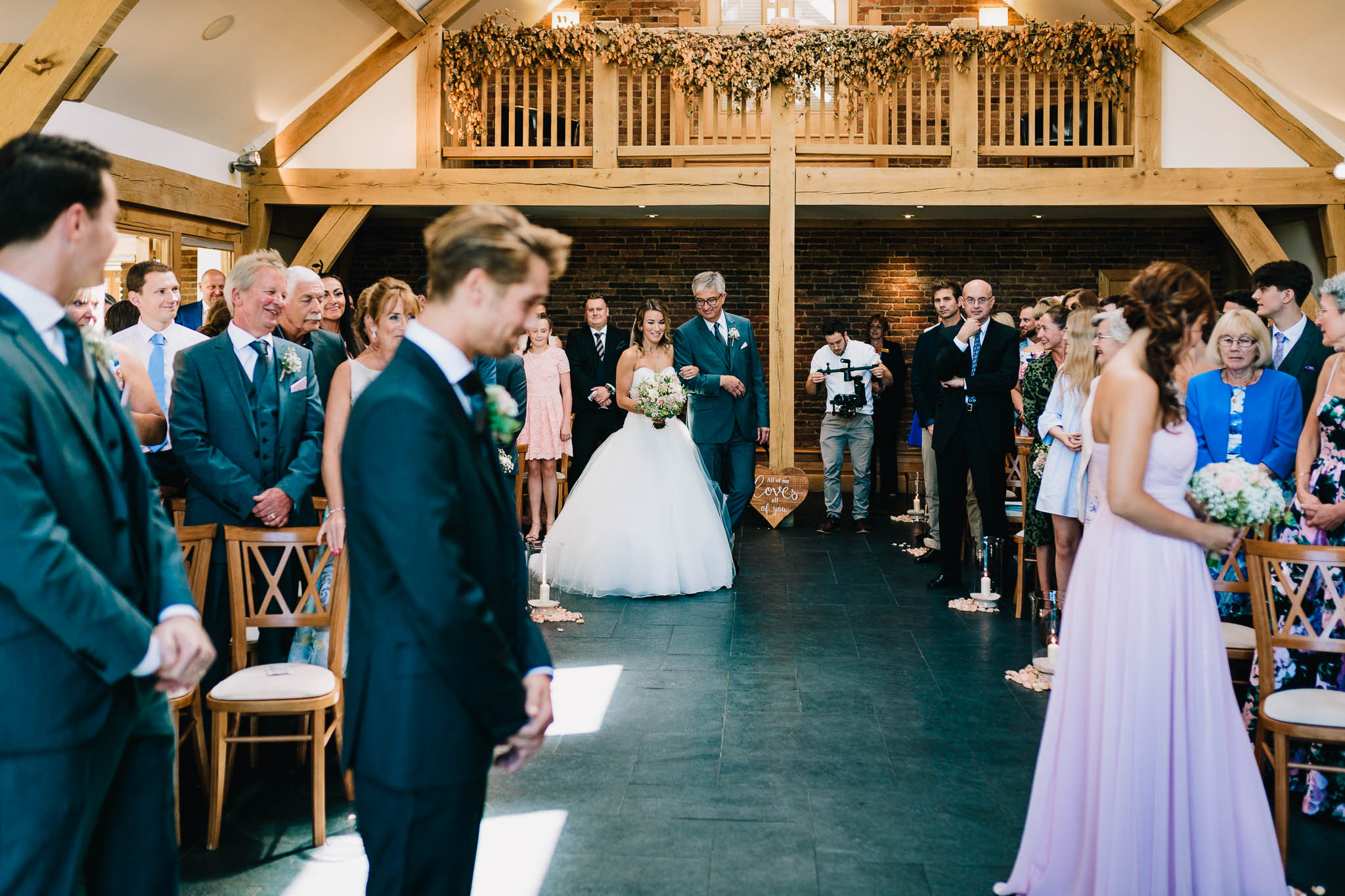 BRIDE AND FATHER AT THE END OF THE ISLE