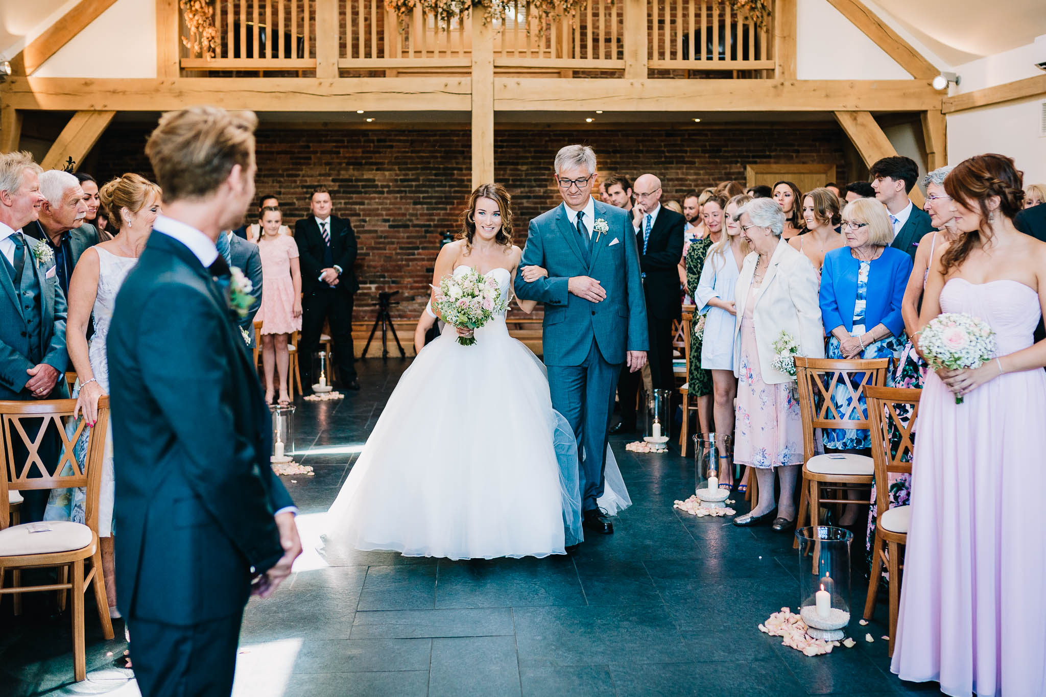 FATHER OF THE BRIDE WITH DAUGHTER WALKING DOWN THE ISLE