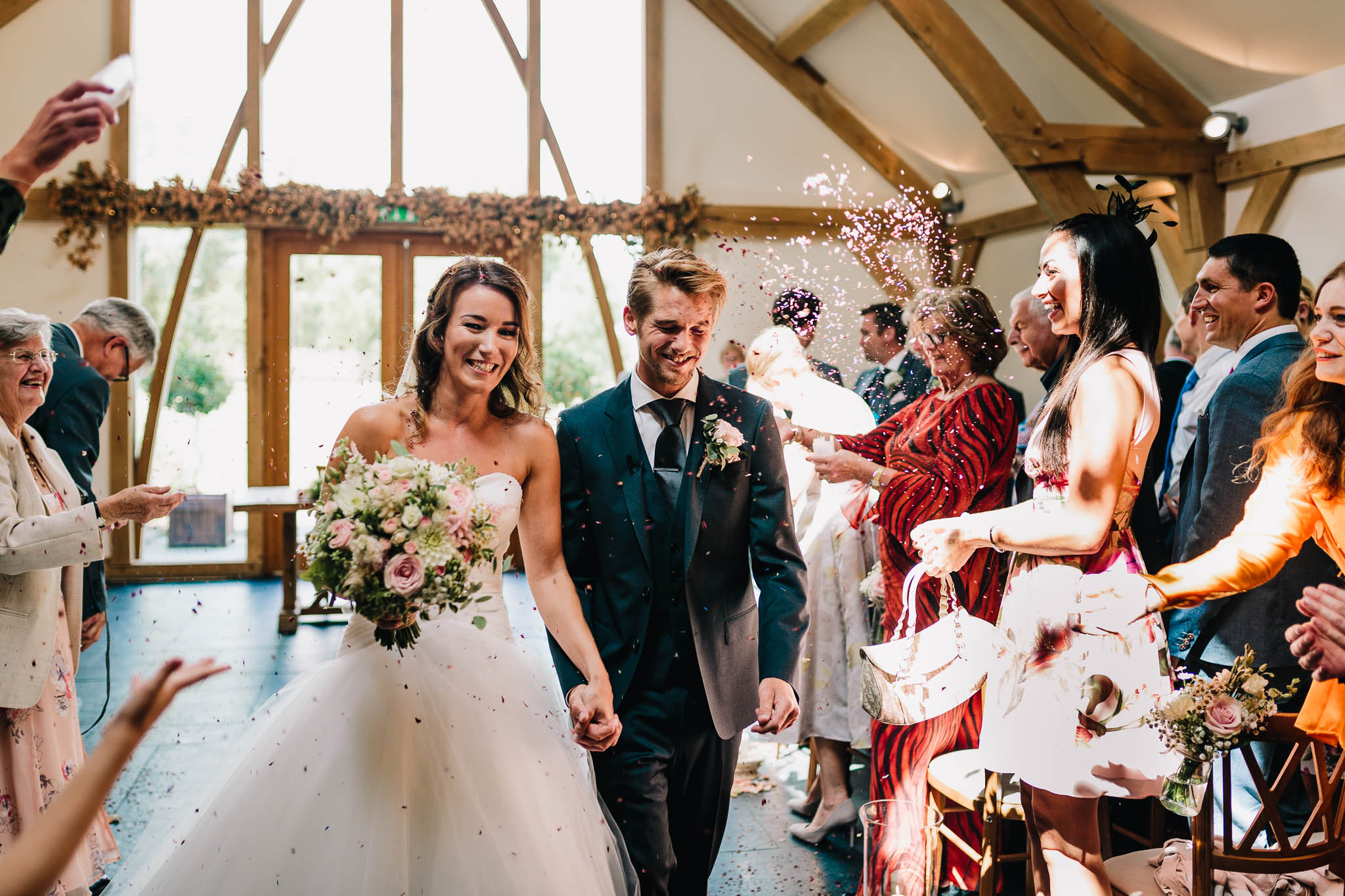 BRIDE AND GROOM CONFETTI WALK AFTER WEDDING