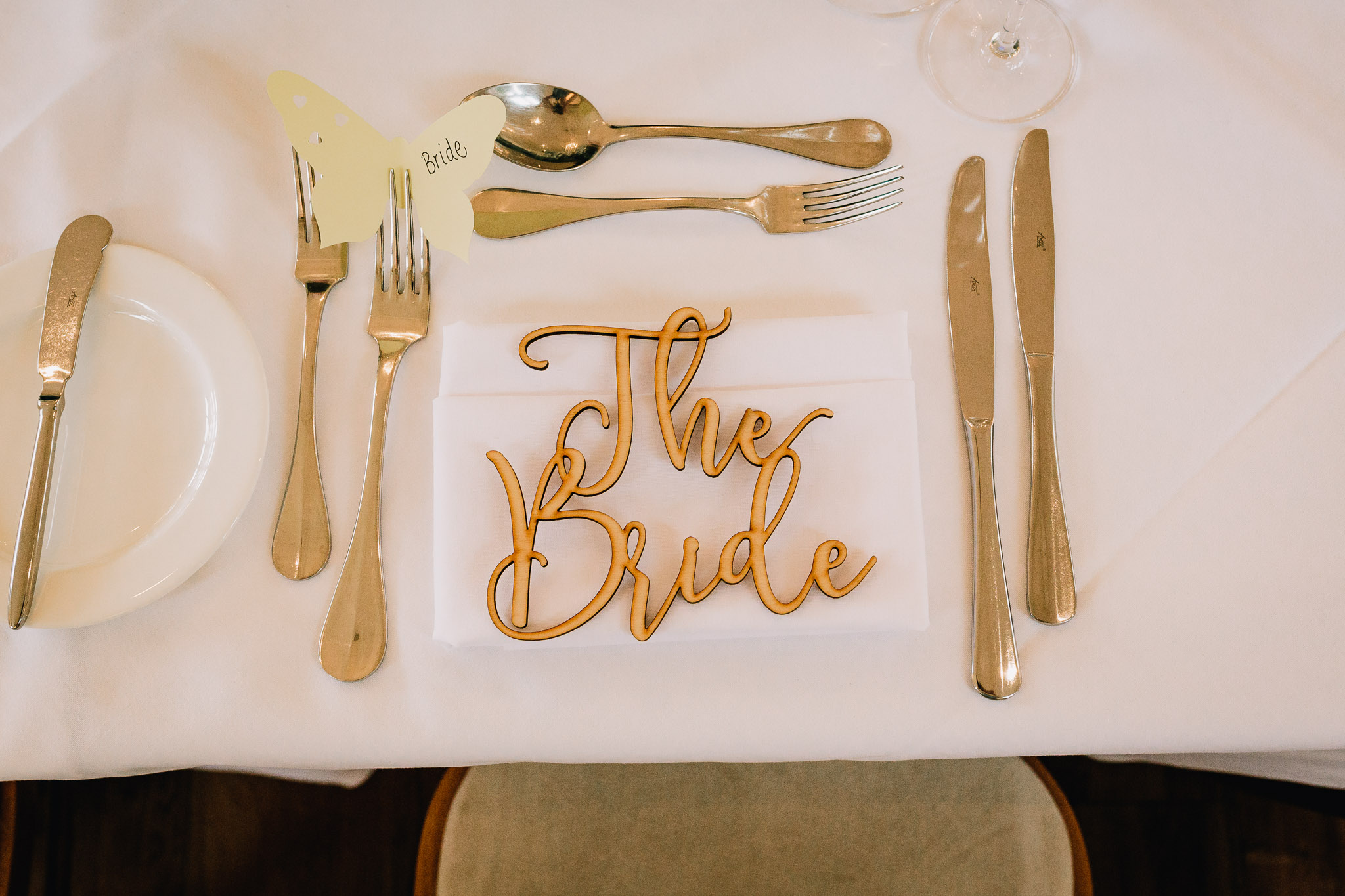 RUSTIC BRIDE PLACE NAME AT WEDDING RECEPTION TABLE