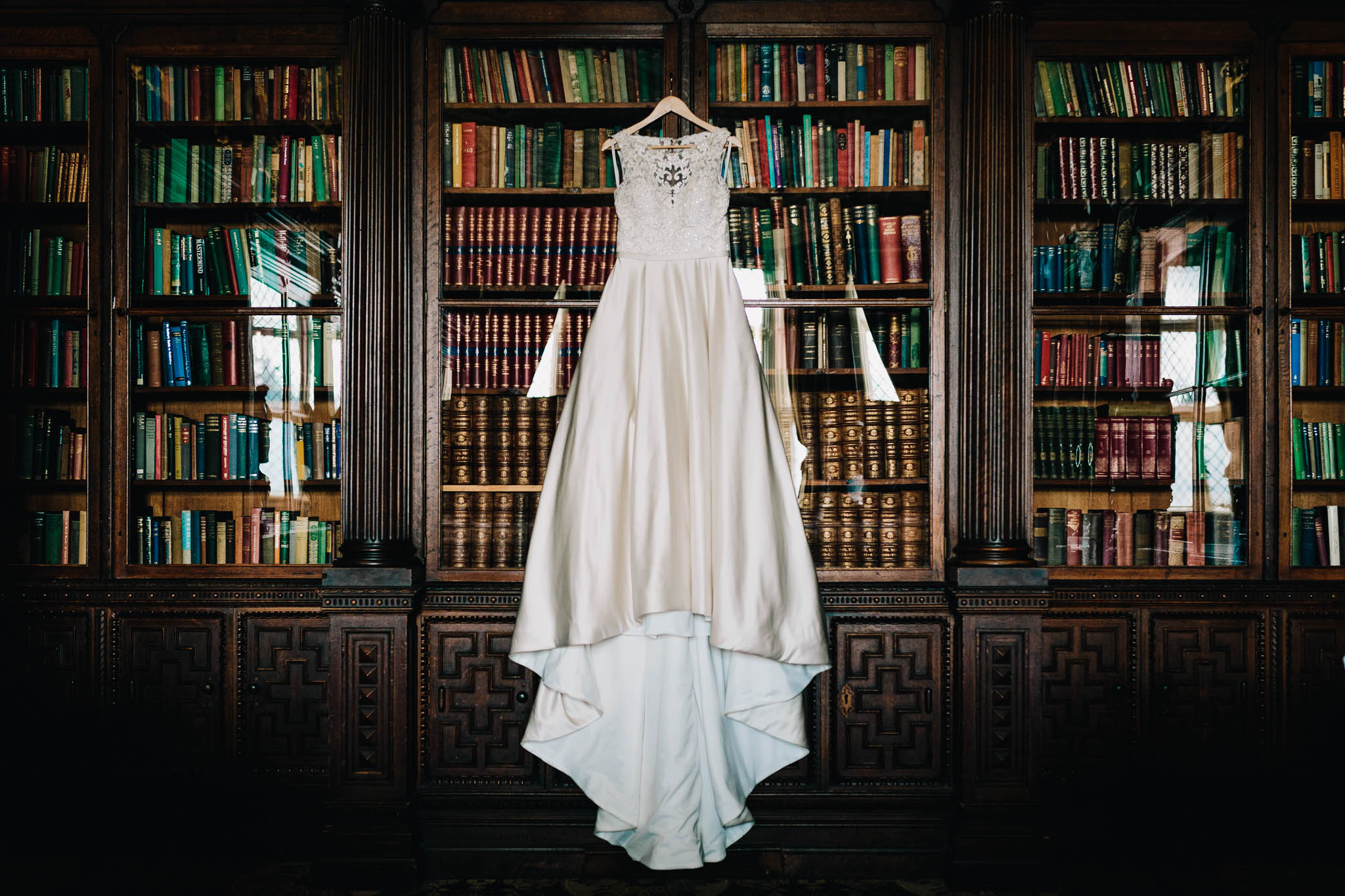 WEDDING DRESS HANGING IN THE GREAT LIBRARY AT HOGWARTS OR CREWE HALL