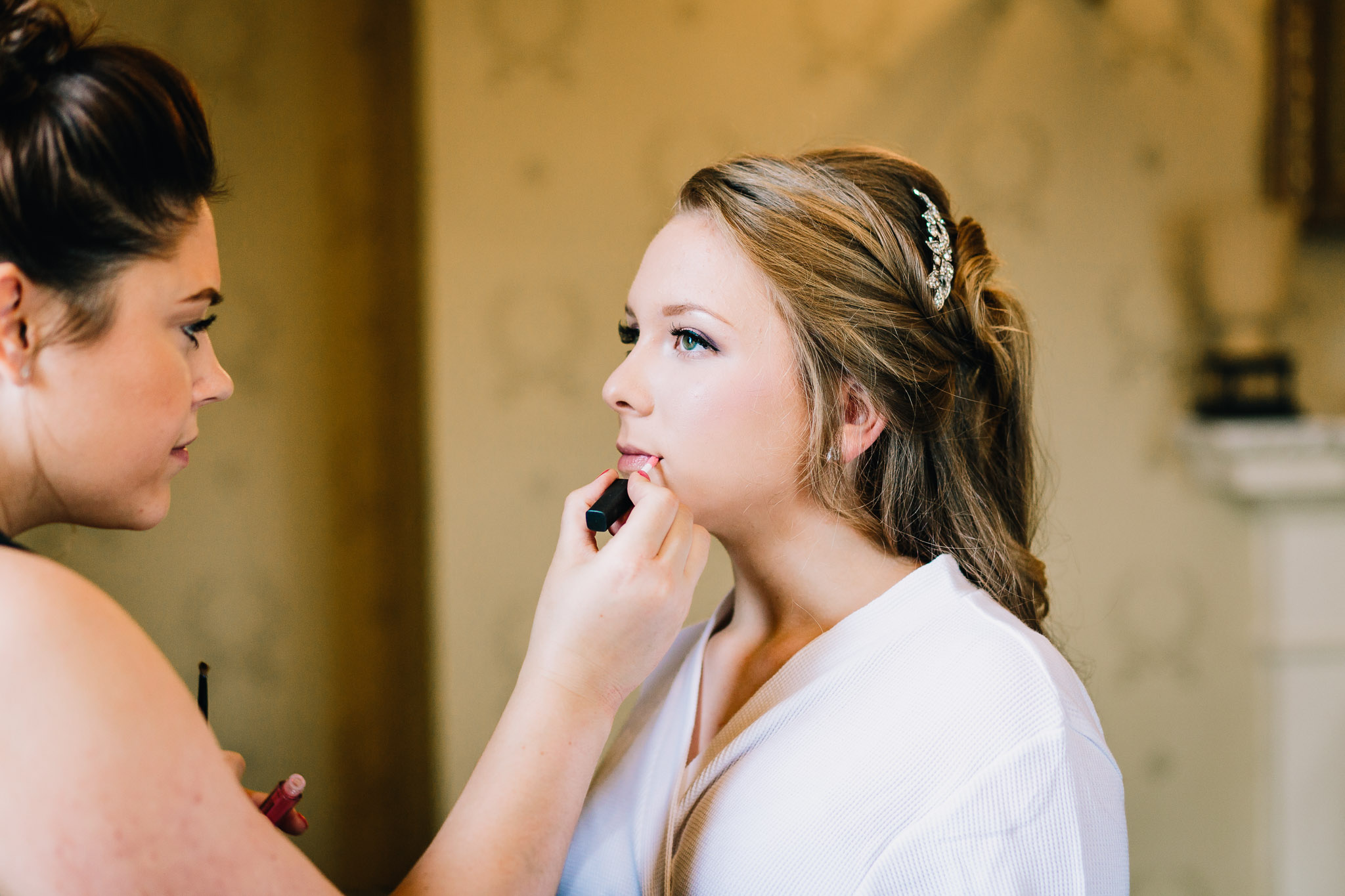 BRIDESMAID HAVING MAKEUP APPLIED BY MUA