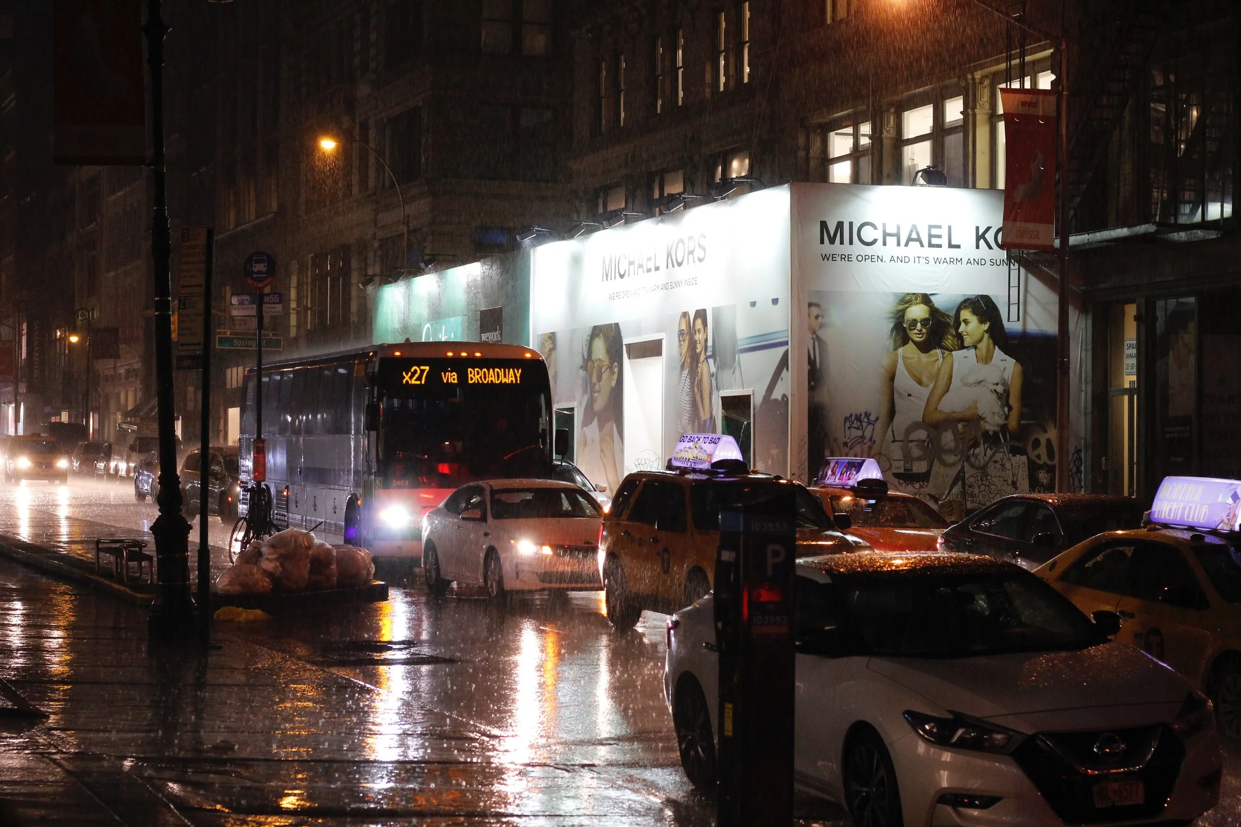 A rainy night in Manhattan with nothing to do? Take photos of oncoming traffic and try not to get yelled at.