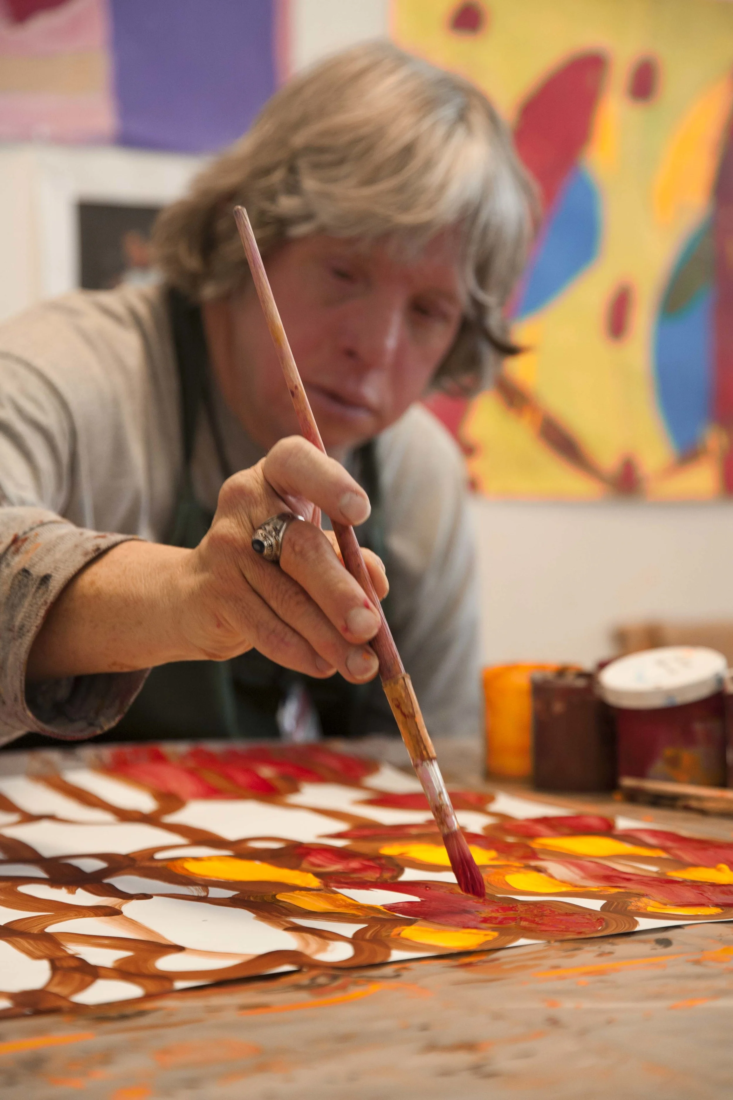 Marvin paints at Art Explorers
