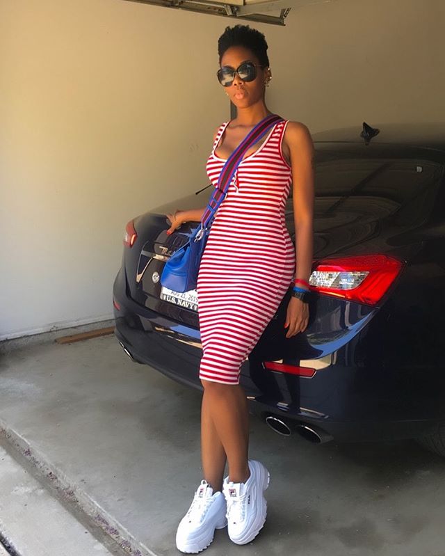 Tank dresses are so uncomplicated .
.
.
.
#chunkysneakers #fila #filashoes #whitesneakers #filadisruptor #platformsneakers #tankdress #stripeddress #trendyoutfits #trendysneakers #nycblogger #naijablogger #stylist #fitteddress #sportychic #respectmyc