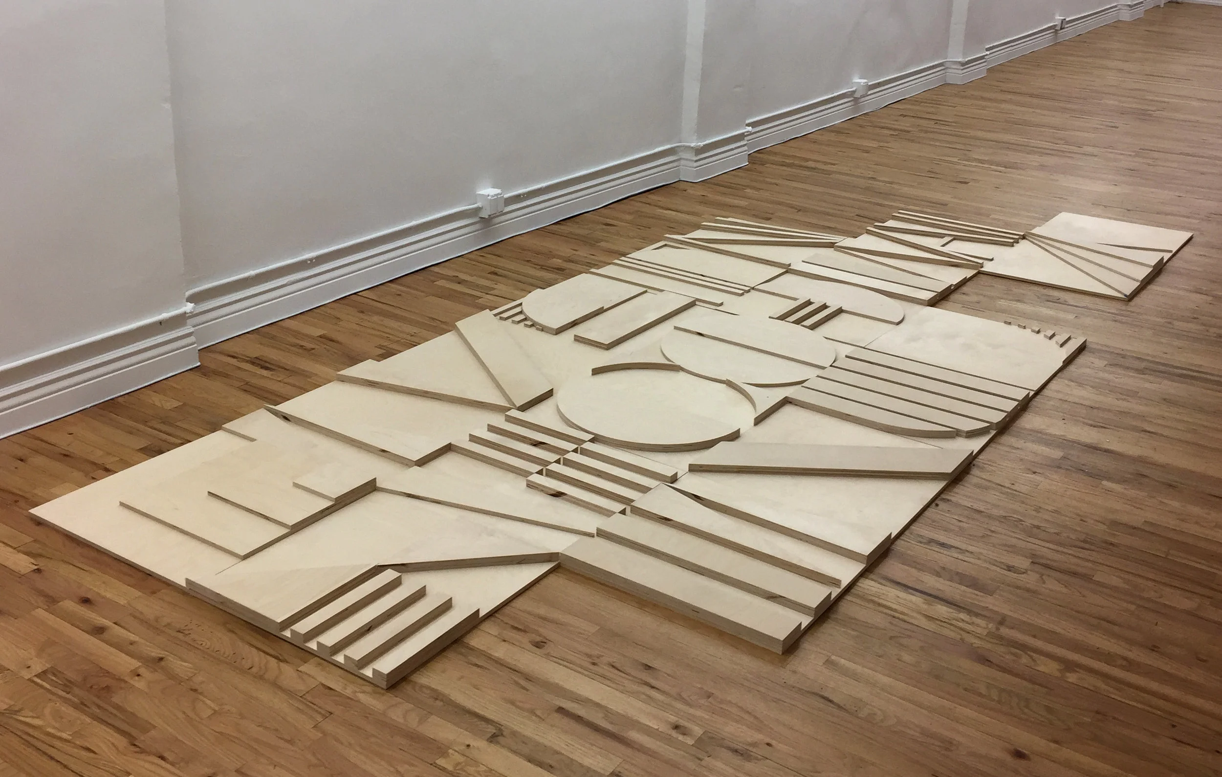 19 panels of birch plywood, to be painted white (work in progress at Hercules Studios)