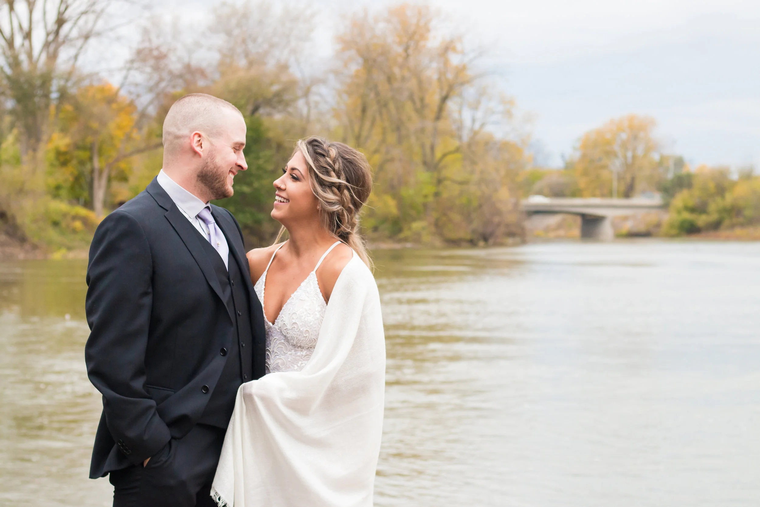 emilysotiphotography-brittany+dave-fallbridegroomsmilelaugh.jpg