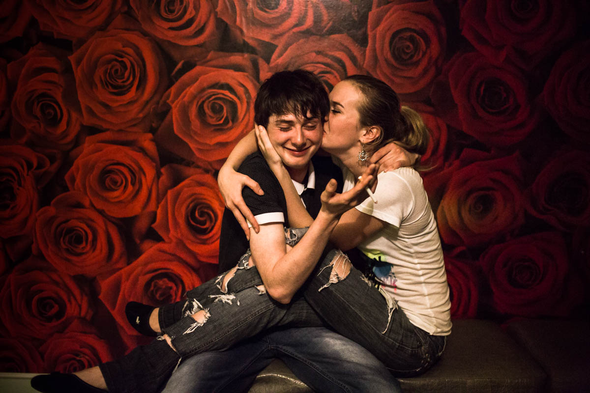 I came to Slavutych to photograph the pure soviet architecture of the city. One evening, while walking in a park, I met Yulia: a teenager girl from the town. She was kissing a guy. She told me: «You can photograph whatever you want, as long as you don't show them to my mother.» .
