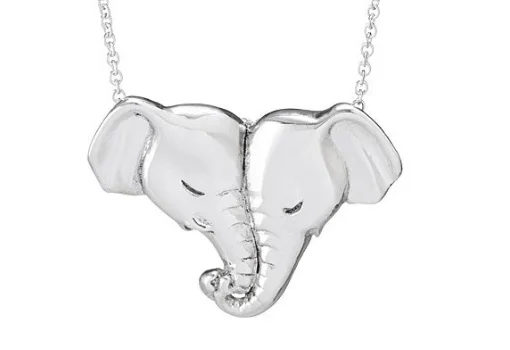 Love Nose Sterling Silver Pendant. Available exclusively at: https://www.uncommongoods.com/product/love-nose-necklace