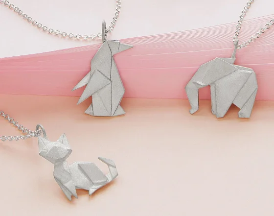Origami Menagerie 7 different animals available in sterling silver here: https://www.uncommongoods.com/product/origami-menagerie-necklaces