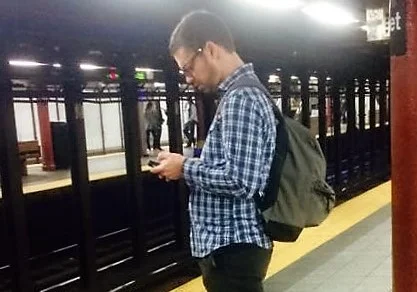 "Text neck" spotting on the NYC subway platform
