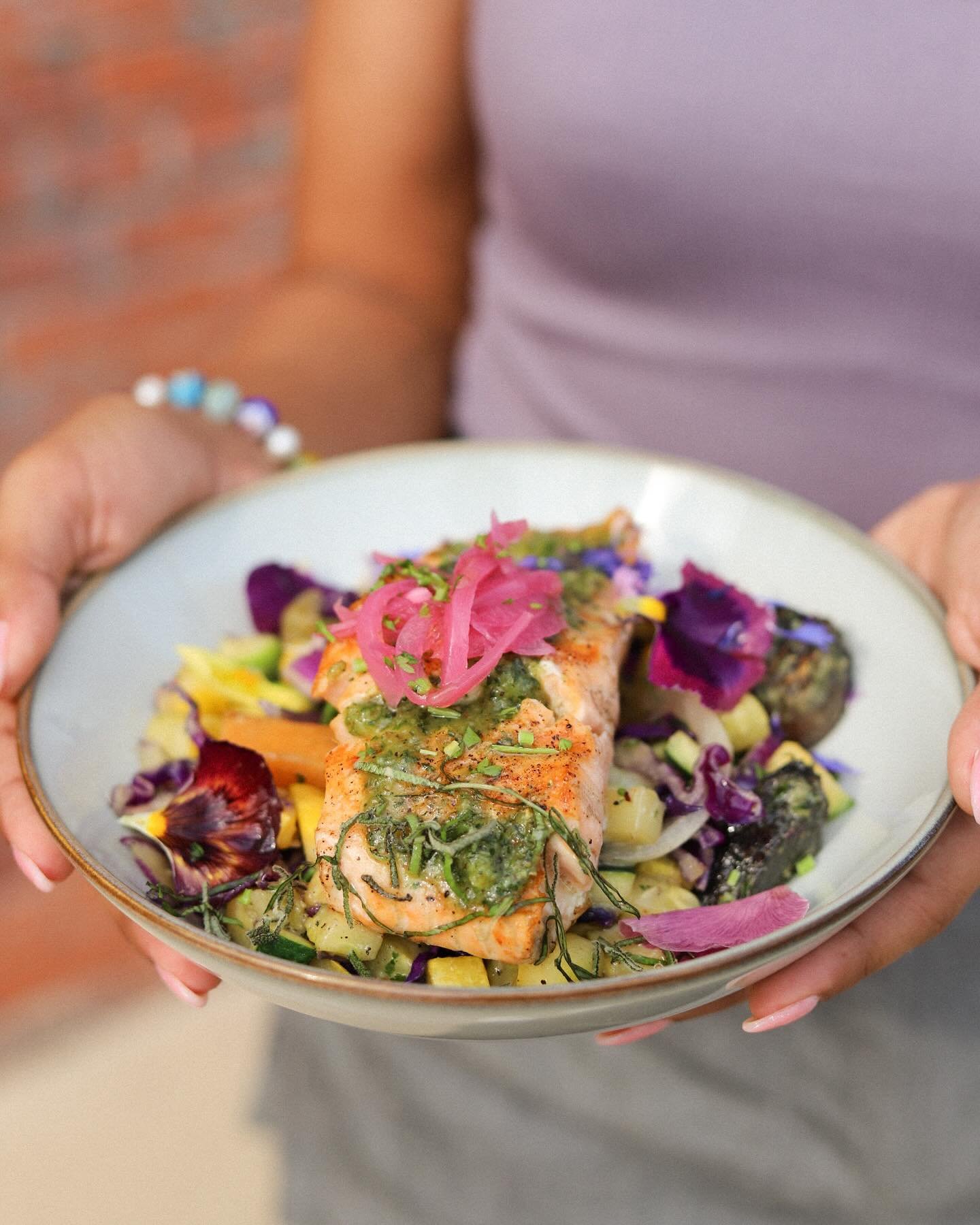 Our newest menu item is perfect for your summer cravings! A Grilled Atlantic Salmon topped with a Sage Pesto!! It also comes with Roasted Beets/ Rutabaga, Summer Squash, Saut&eacute;ed Red Cabbage, and Pickled Red Onions!!

Walk-ins always welcome. M