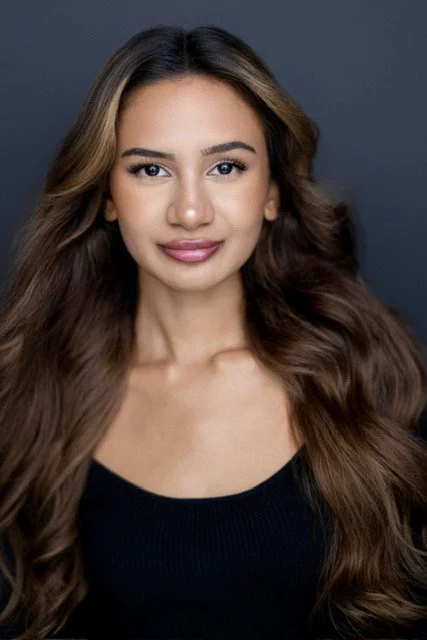 Dhanisha R.