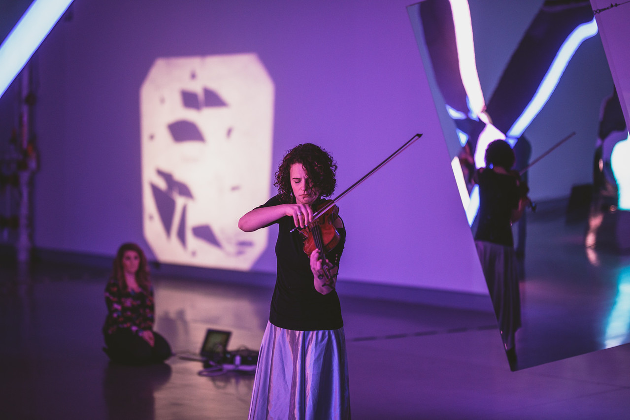 Becca KANEKO purple playing.jpg