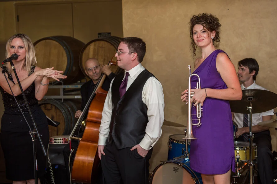 WEDDING - "The Secret Jazz Band Featuring Katie Harris made my day so incredibly special. They were professional, on time, and prepared with the song selections and announcements. Having live music at the wedding made such a difference. As a surprise, our family members request they play a song for us. The band was more than accommodating and seemed thrilled to welcome the opportunity to play with more people. Katie sang beautifully and the other players did an incredible job. Even after lots of people had moved outside, the band continued to play and it was a great moment for us to sneak in another dance. They made my wedding the best day of my life." -Renee F, Temecula, CA