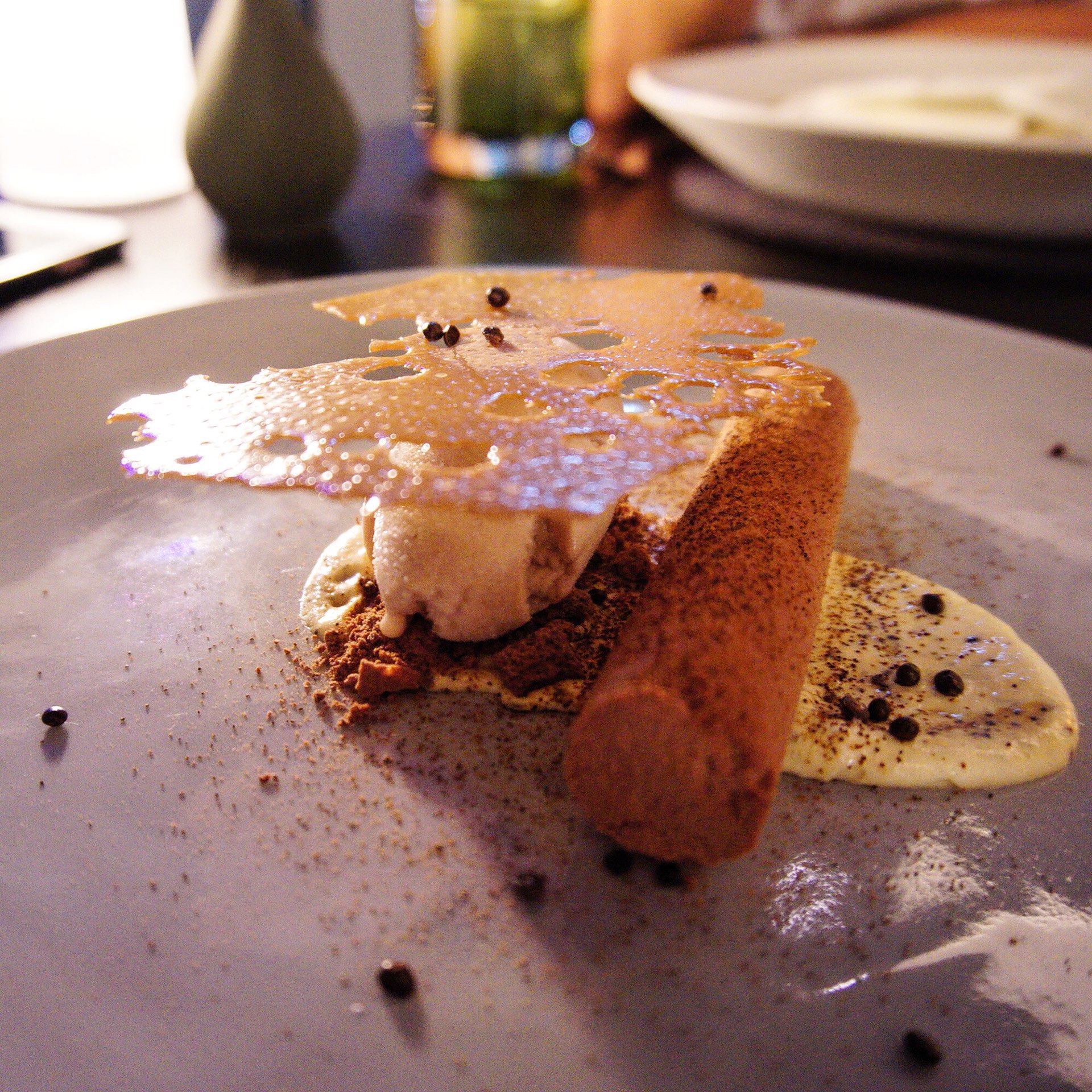 Bahen & Co Chocolate Mousse with wattle seed cream and baked banana sorbet