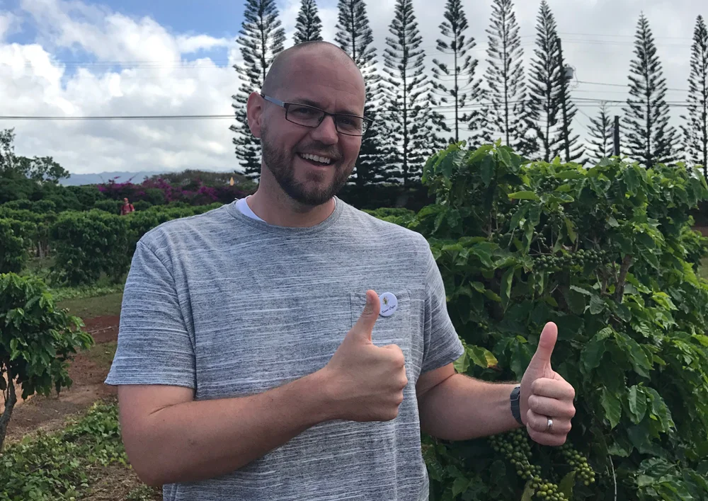 Here we have a big dork just happy to be on a coffee farm.