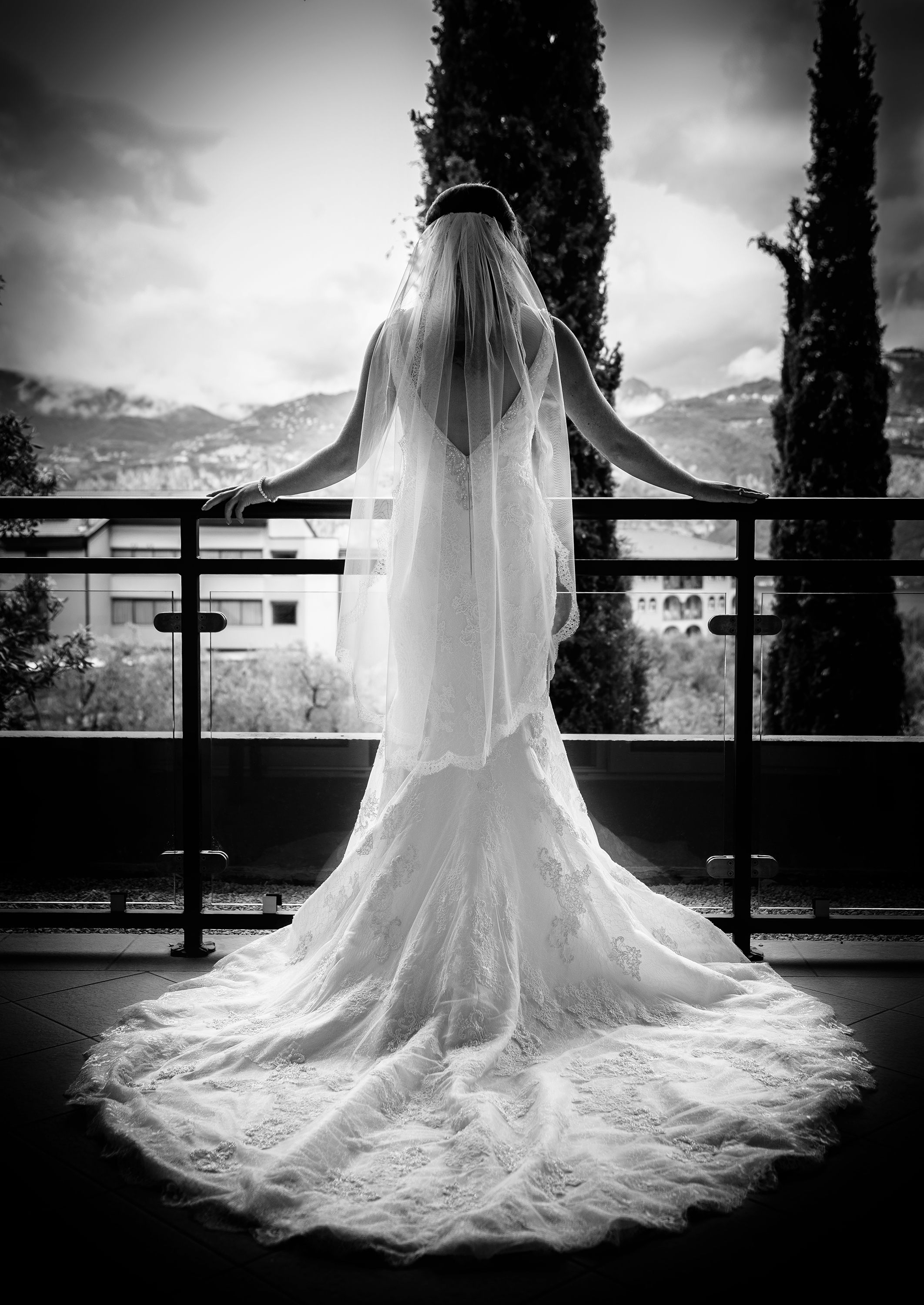 Black and White image of a bride wearing her wedding dress shot in Italy