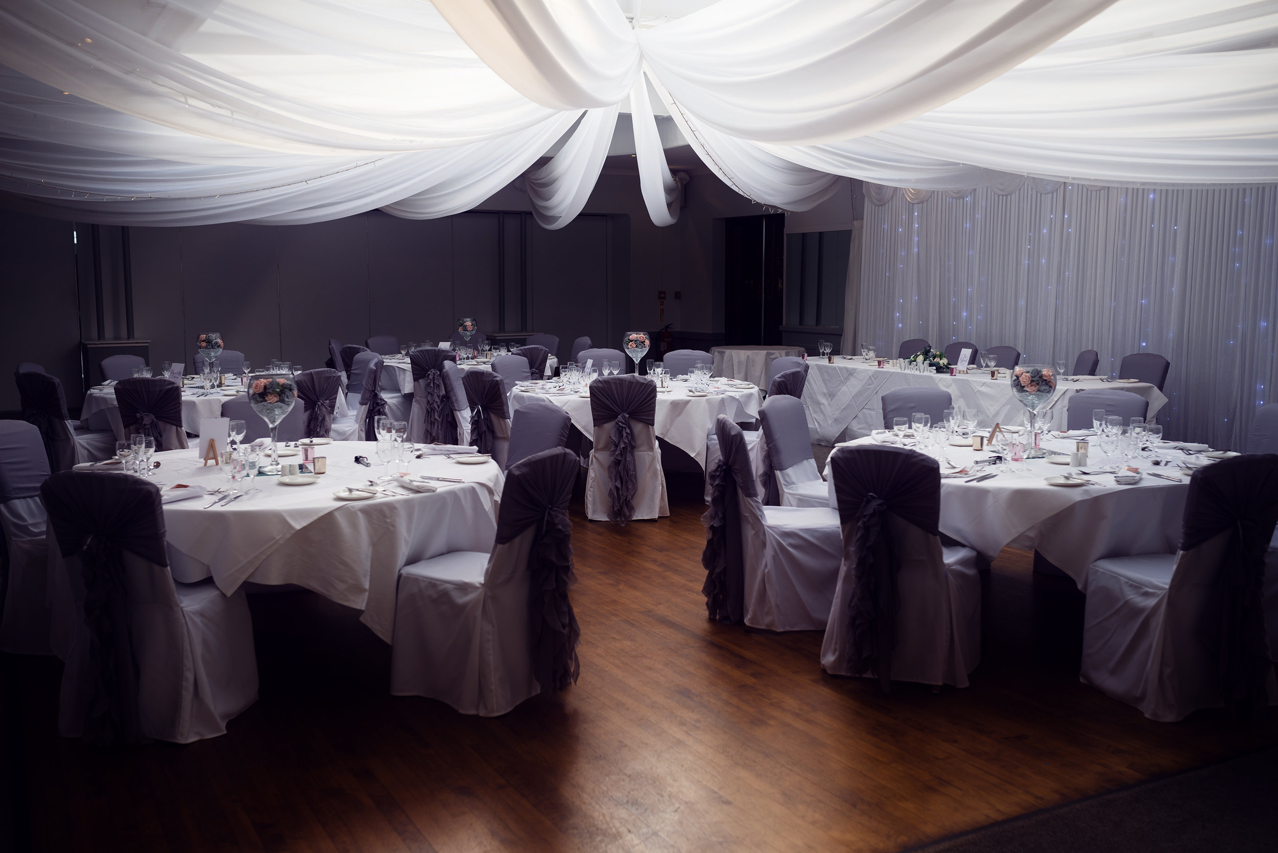 Wedding breakfast room setup at Stirk House